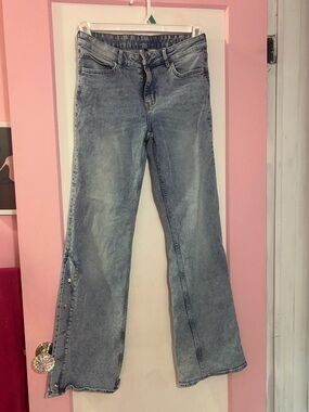 Divided Light Blue Flare Jeans with Side Snap Detail